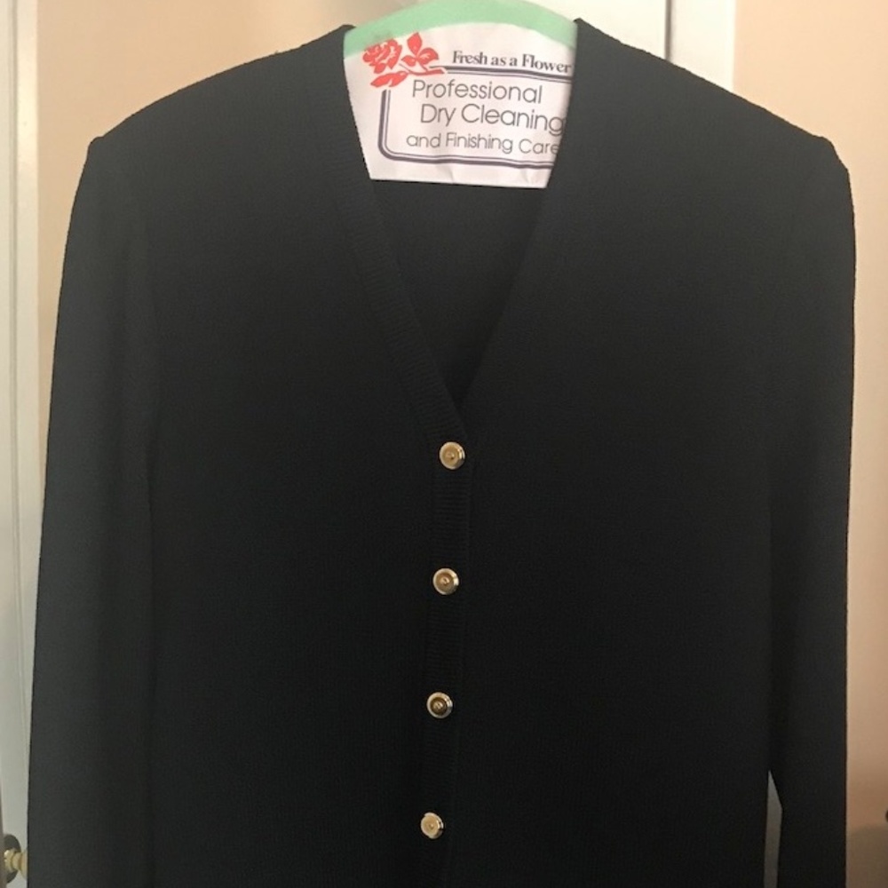 St John Cardigan with pleated knit hem ruffle.